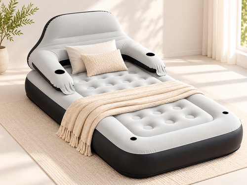 Inflatable lounge chair laid flat as a single sleeper in a bright bedroom